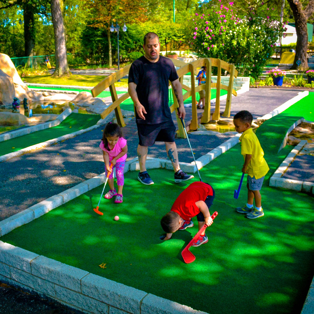 Guests Enjoy A Round Of Mini Golf