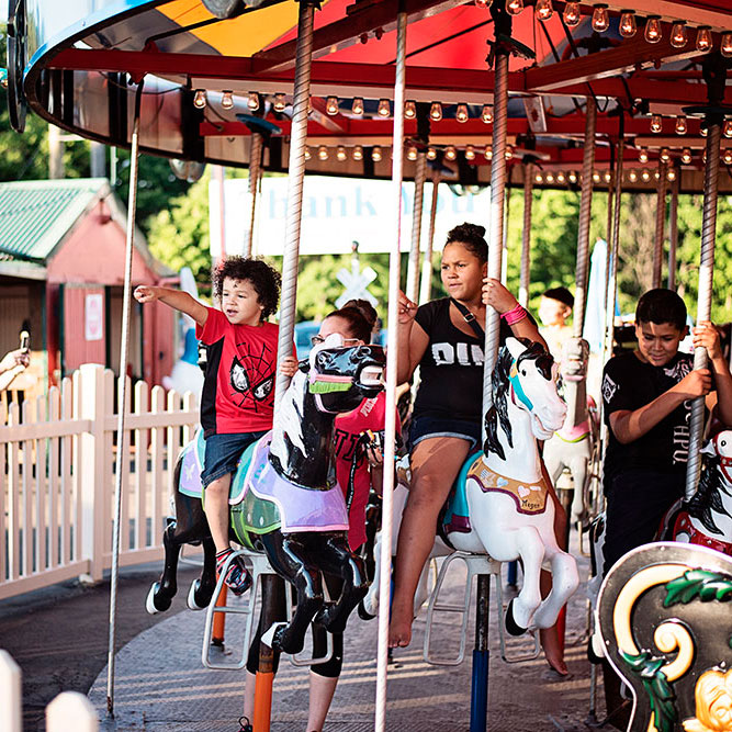 Guests enjoy the Merry Go Round